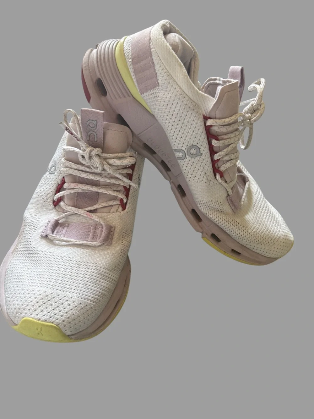 On Running Women's Cloud in Pale Pink with Red Accents